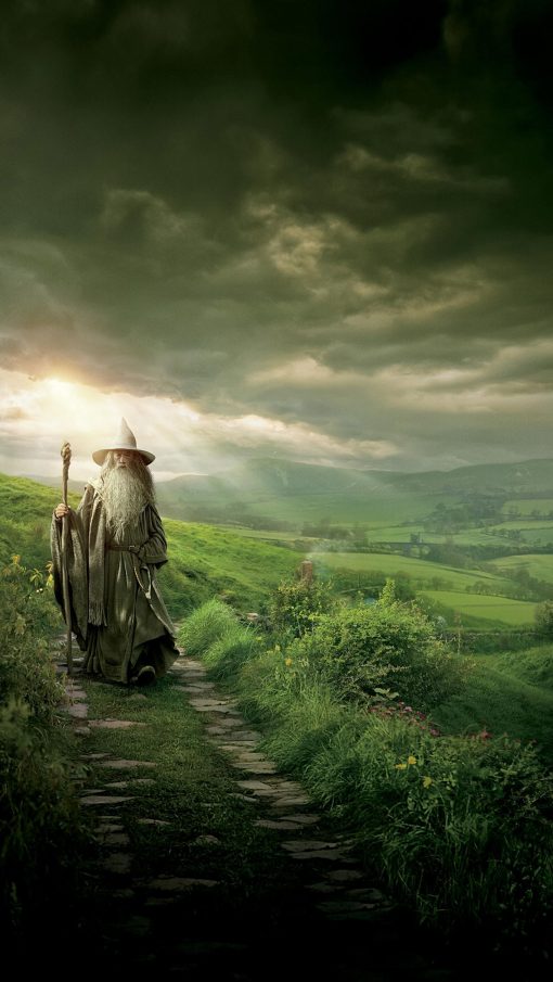 Capture the serene beauty of Middle-earth with a handmade oil painting on canvas, showcasing Gandalf the Grey strolling through the picturesque Shire beneath a breathtaking sunrise. This unique artwork beautifully encapsulates the essence of The Lord of the Rings, perfect for dedicated fans. Crafted with meticulous detail and warm colors, this high-quality painting becomes a cherished addition to any collection, offering a captivating centerpiece for enthusiasts of Tolkien's timeless saga.