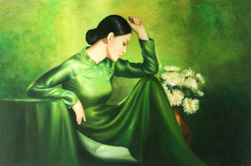 Beautiful green ao dai Vietnamese lady