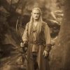 Embark on an enchanting journey through Middle-earth with a meticulously crafted oil painting on canvas, featuring a captivating vintage-style portrait of the iconic Legolas. This unique artwork beautifully captures the timeless allure of the beloved character, meticulously painted with intricate details and masterful brushstrokes. A treasure for fantasy art admirers, this piece vividly brings Legolas' charisma and mystery to life, showcasing expert craftsmanship. A stunning addition to any collection, this high-quality painting offers a nostalgic gateway into Tolkien's realm, making it a captivating focal point for any space.