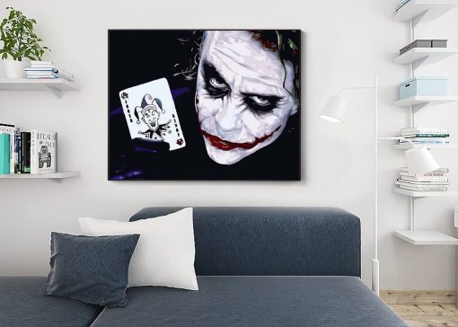 Immerse yourself in our mesmerizing handmade oil painting on canvas, featuring Heath Ledger's unforgettable portrayal of the Joker from the iconic Nolan movies. This stunning artwork vividly depicts the Joker holding the infamous Joker card, capturing Ledger's enigmatic performance with intricate detail and vivid colors. Crafted by skilled artisans, this masterpiece encapsulates the essence of Ledger's Joker, appealing to movie aficionados and art enthusiasts alike. Elevate your space with this compelling portrayal, a captivating blend of movie-inspired artistry that brings the Joker's haunting presence and the symbolic card to life on your walls.